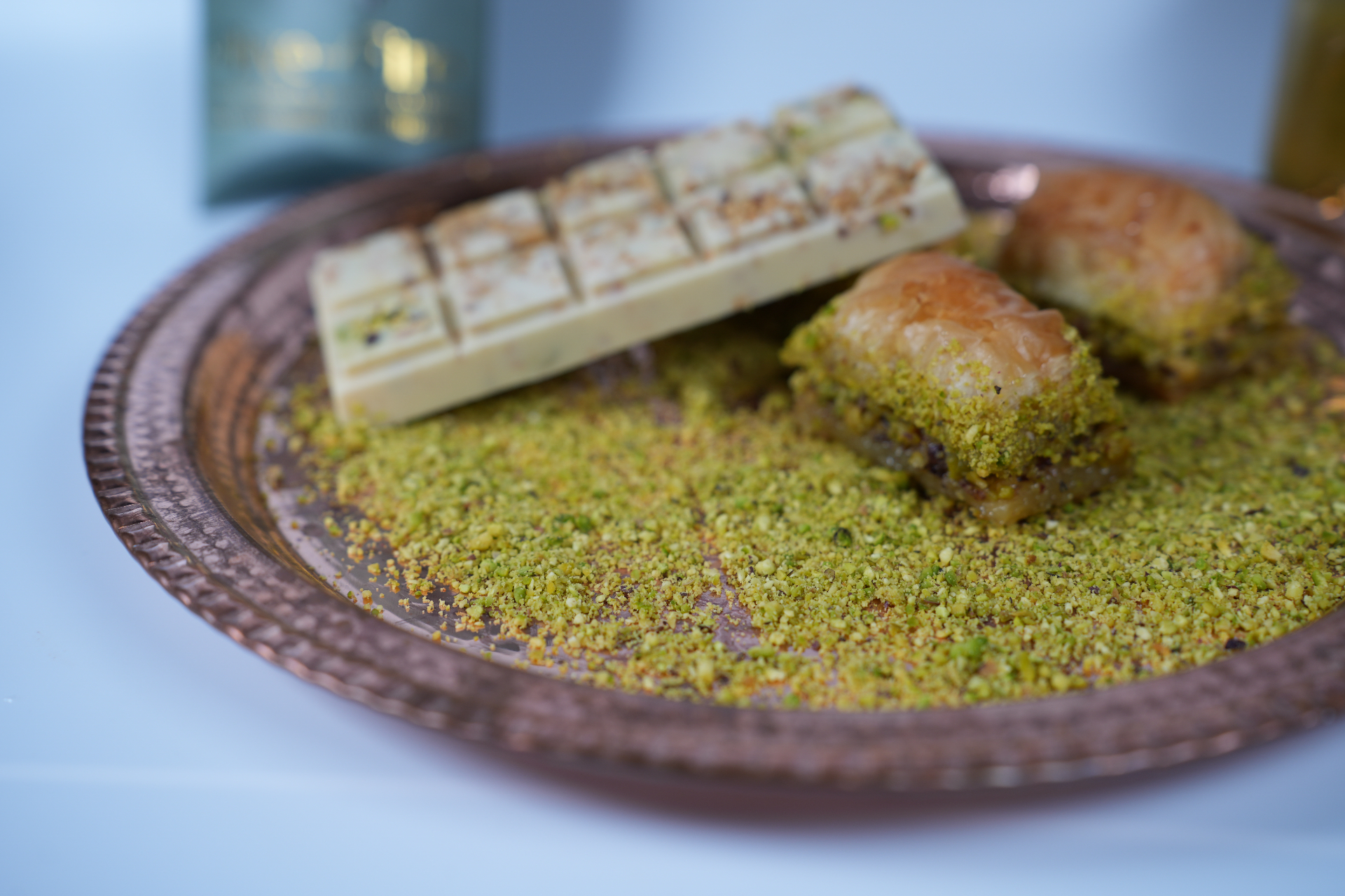 Hand-stretched phyllo sheets on a floured wooden table